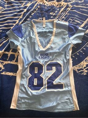 Women's Light Blue Jersey Top with Number 82